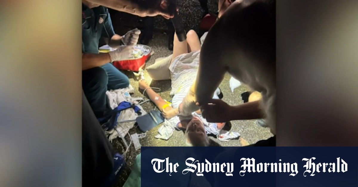 Man charged over alleged axe attack on neighbours