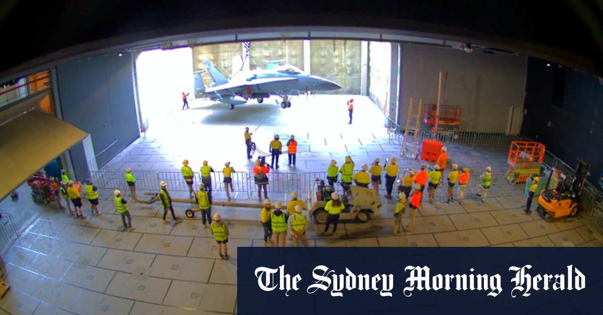 Timelapse of Hornet plane being installed