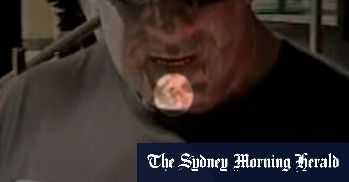 Former bikie charged with showing swastika tattoo in public