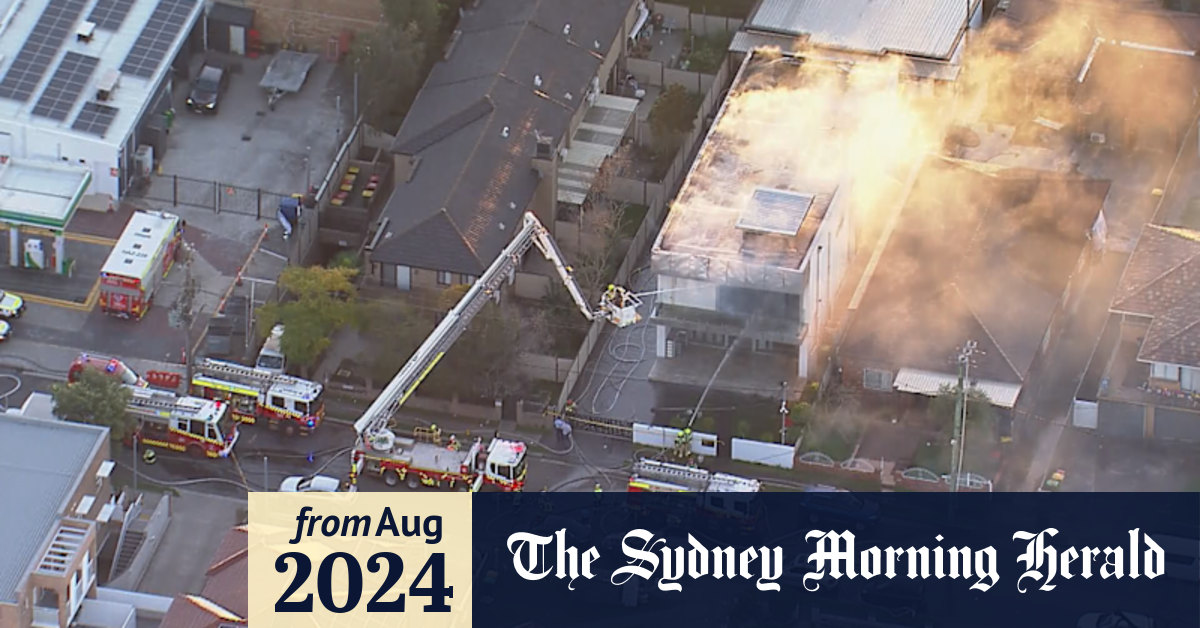 Video: More than 40 firefighters are battling a house fire in Sydney
