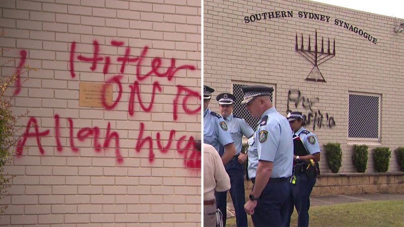 Two charged over antisemitic graffiti