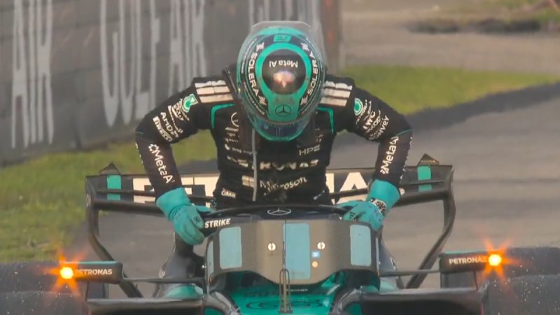 Russell sighs as he's forced to retire