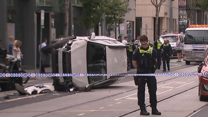 Two teens arrested after car crashes, rolls on busy inner-Melbourne street