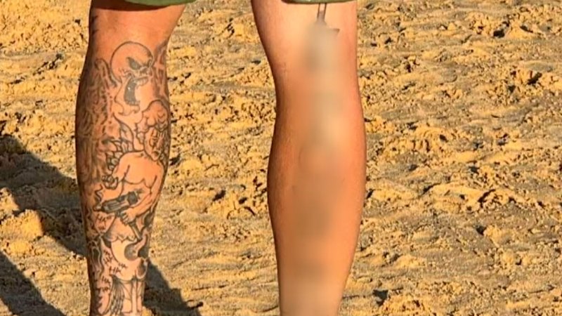 Father charged after allegedly displaying Nazi tattoos