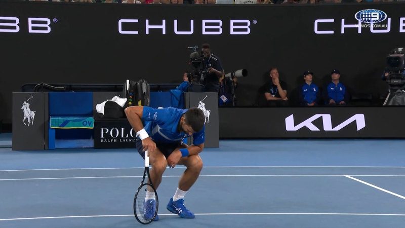 Novak clutches at knee after point