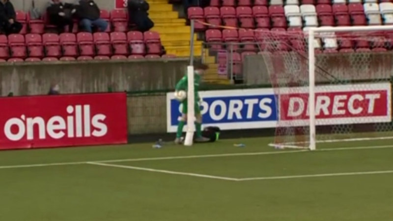 Goalkeeper pushes ball boy