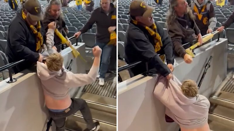 Hawks fans filmed in MCG brawl