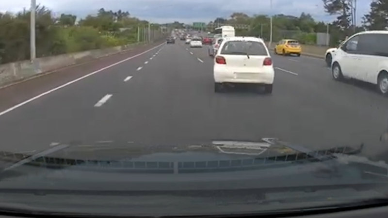 Commuters rush to stop runaway car in New Zealand