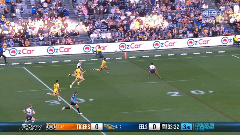 Josh Addo-Carr helps deliver a try against the Tigers