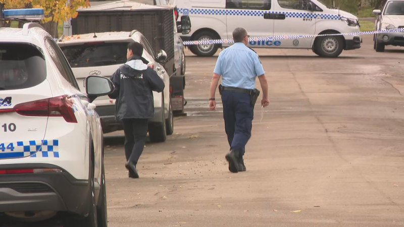 Woman arrested after man's body found in Sydney