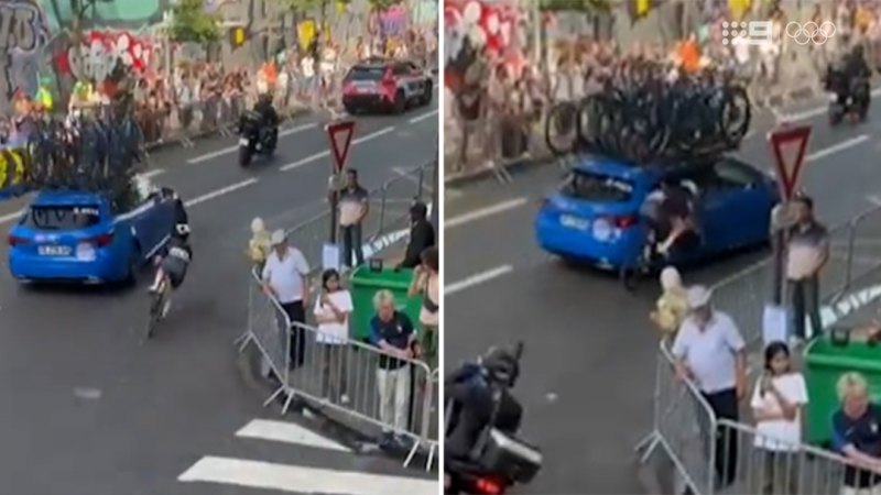 Olympic cyclist crashes into car