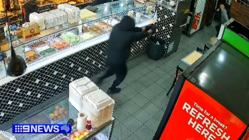 Man arrested over daylight gangland shooting at Auburn kebab shop