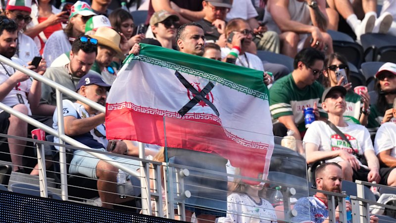 Iranian Football Fans Express Dual Stance Ahead of Match