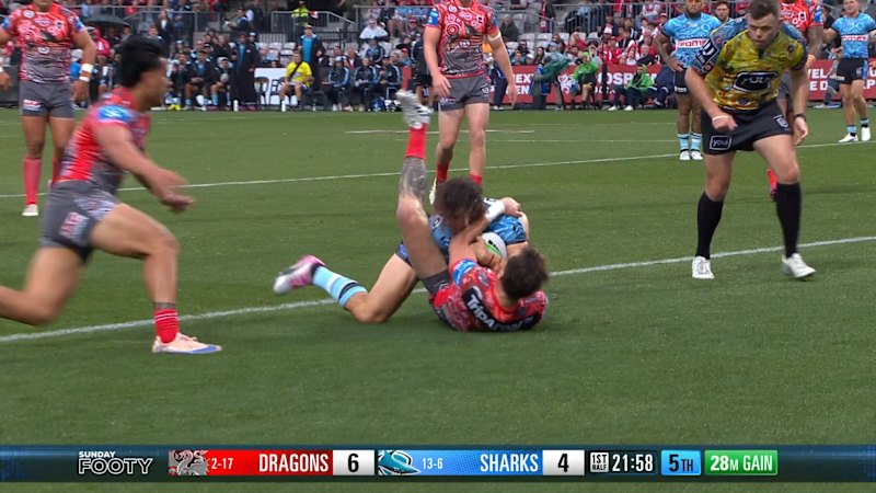Clint Gutherson makes a try-saver after Nicho Hynes sends a kick into touch