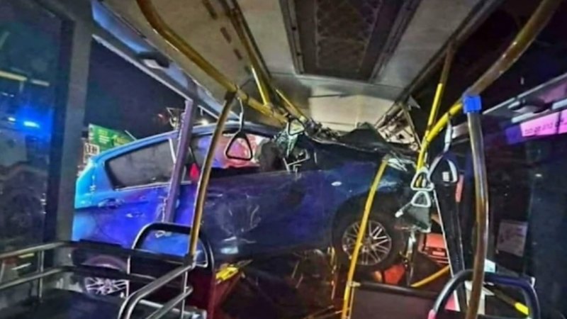 Car launches into side of bus in freak collision