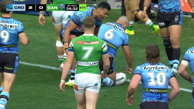 Braydon Trindall dislocates shoulder while scoring for Sharks against Raiders