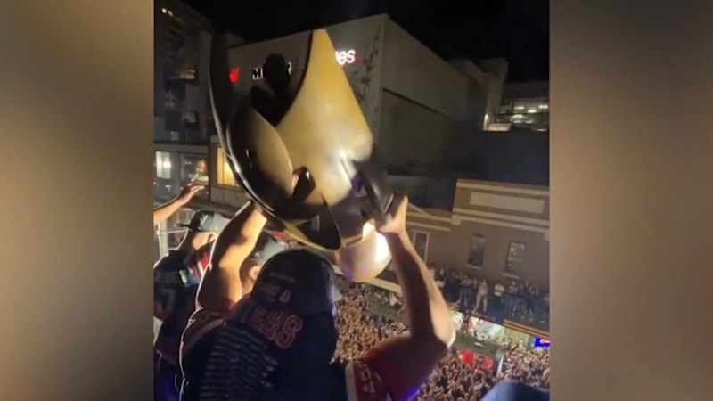 Roosters players celebrate grand final win