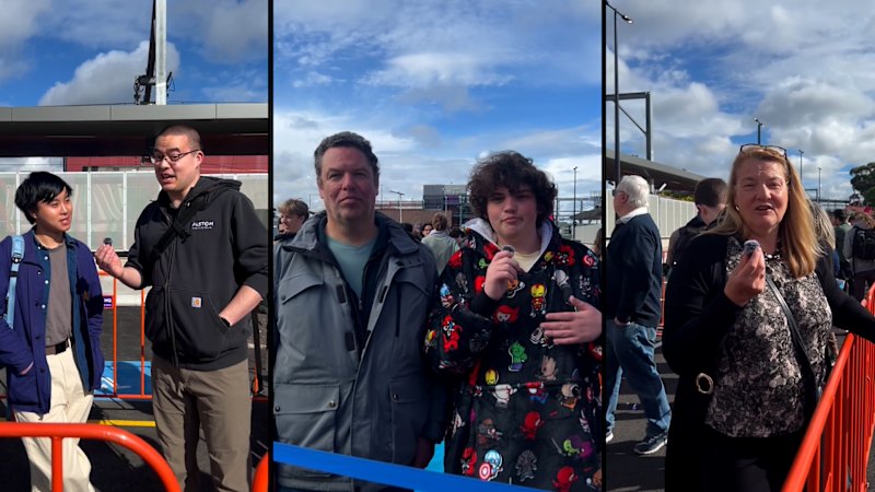 Commuters get ready to board first train to Metro Tunnel