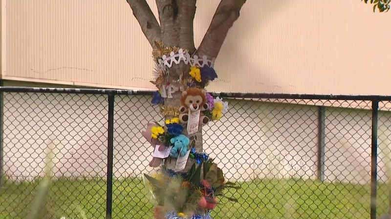 Brisbane community mourns toddler hit by car outside school