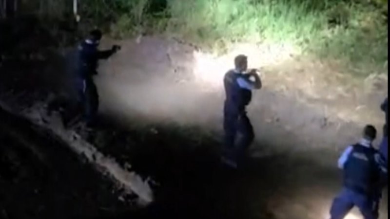 Hunt for gunman who put suburb into lockdown