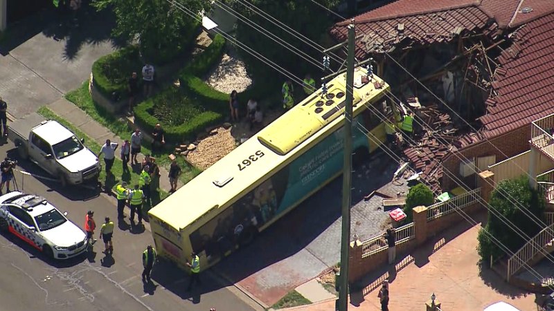 Bus crashes into house in south-west Sydney