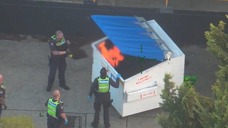 Police arrest man hiding in dumpster after car chase