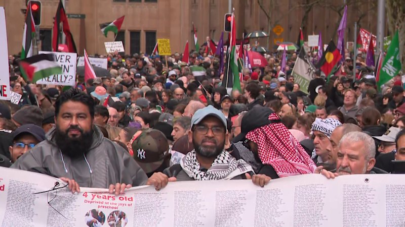 Pro-Palestine protesters prepare to march across Sydney Harbour Bridge