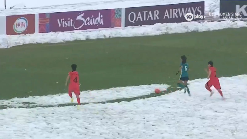 Young Matilda battles snow and beats opposition to score