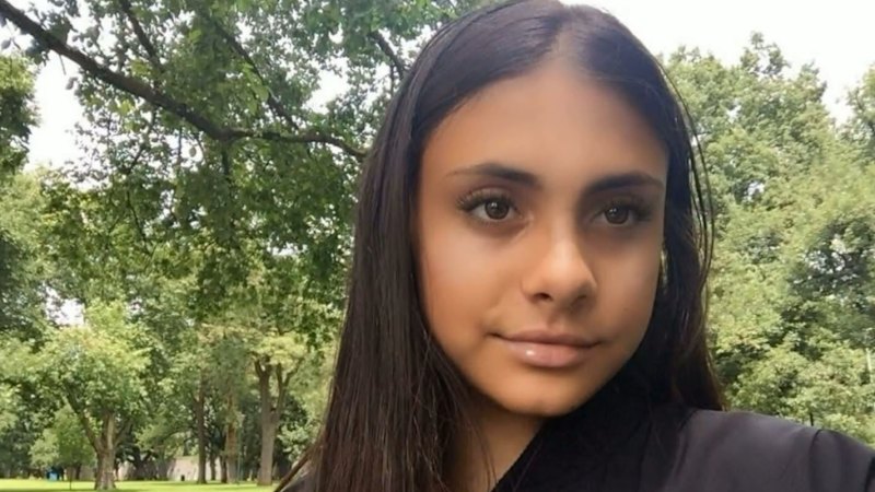 Man hands himself in after woman found dead in Melbourne apartment
