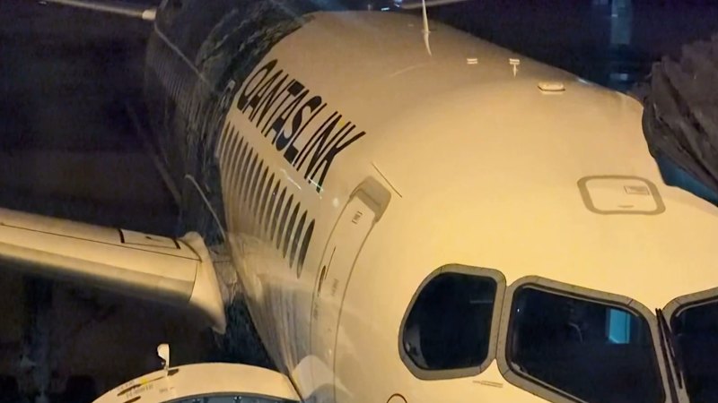Qantas plane evacuated as smoke fills cabin