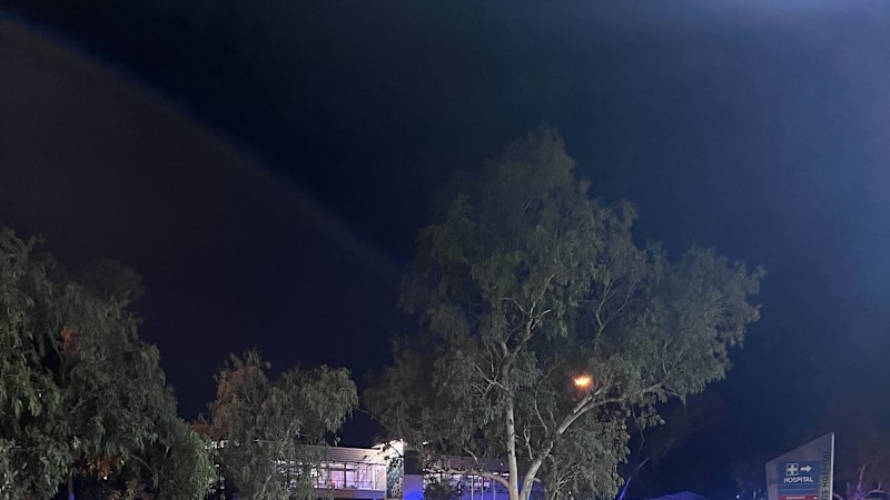 Chaos erupts as angry crowds surround Alice Springs hospital after fugitive's arrest