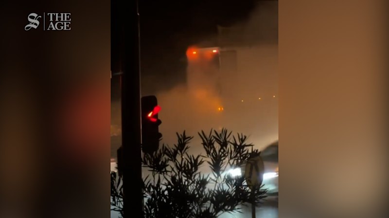 Garbage truck spews burning rubbish on Bell Street after suspected lithium battery fire