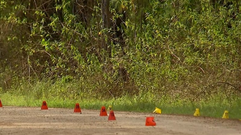 Four arrested after man found dead beside car in Queensland