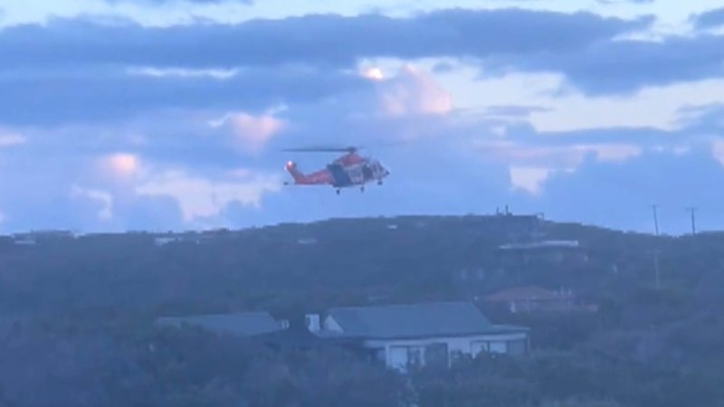 Teen charged as man, 18, falls from car roof during schoolies