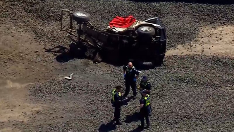 Two men killed after ute collided with freight train