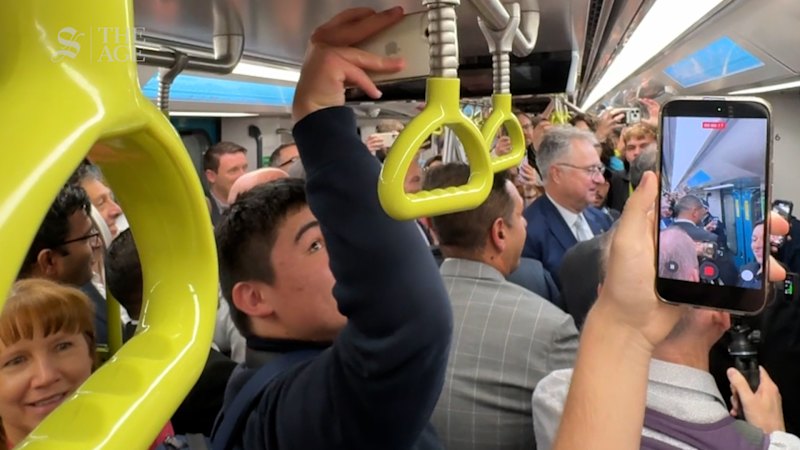 Crowds cheer as mega rail project’s final stage opens