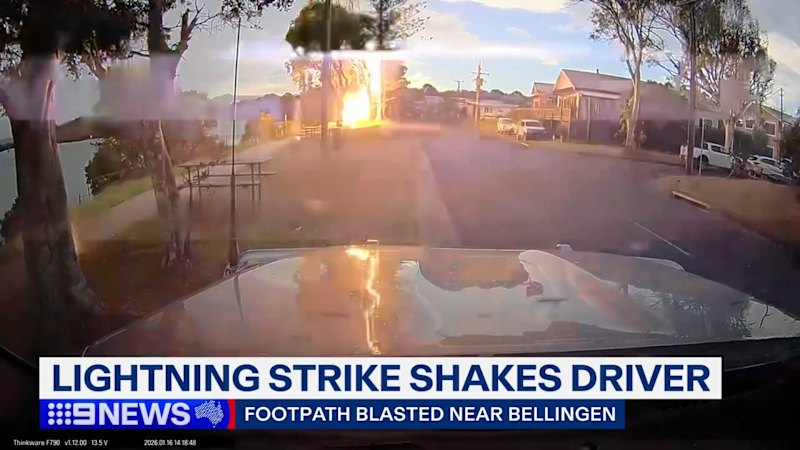 Dashcam captures lightning strike metres away
