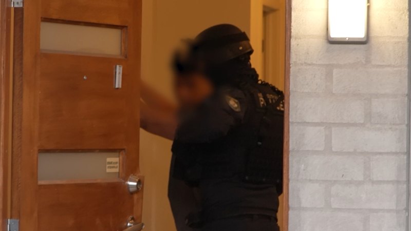 Bank employee arrested over alleged 'ghost car' fraud in Sydney