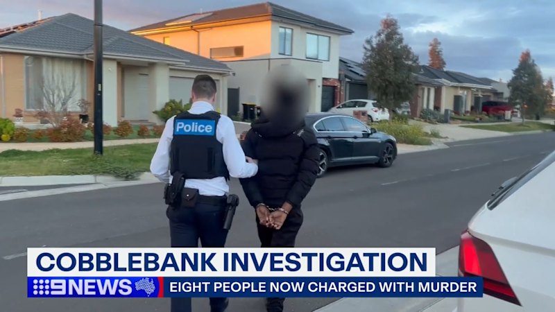 Eight people face double murder charges over alleged machete murders