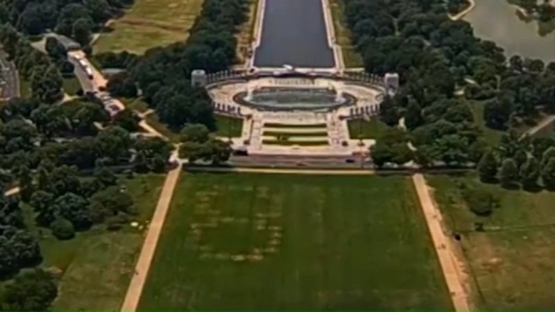 8647 etched on National Mall grass