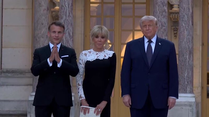 Trump Welcomed by Macron at Versailles Palace