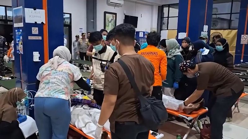 Dozens of ferry survivors rescued after overturned vessel reach Indonesian port