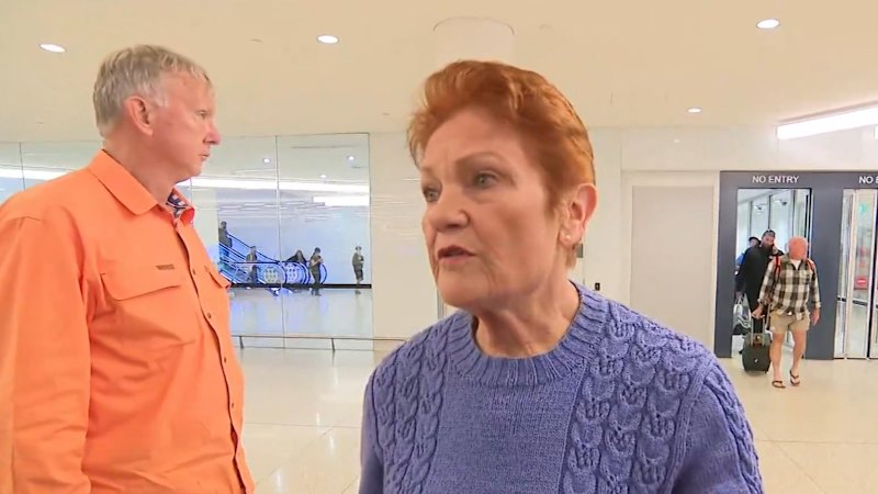 Pauline Hanson met by protesters at sold-out Perth