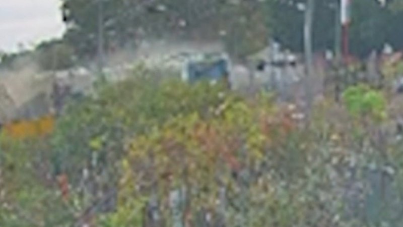 Footage captures moment truck and train collide