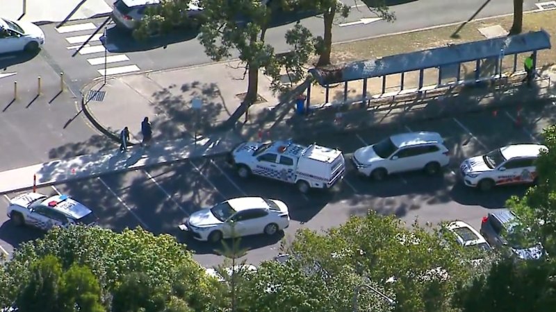 Teenager arrested, another critical after alleged high school stabbing