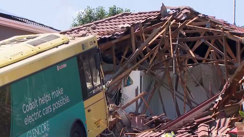 Terrifying footage of bus crashing into home