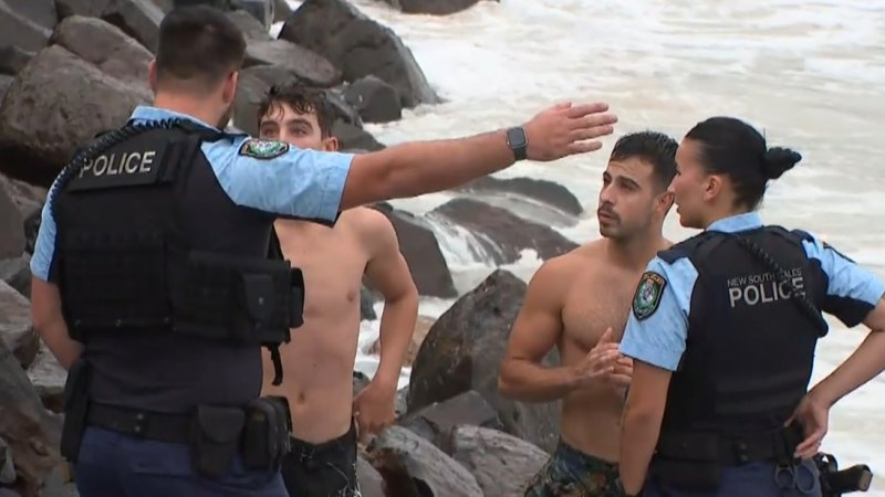 Backpackers surf despite warnings