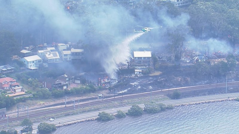 Sudden wind change could worsen fires on the NSW Central Coast