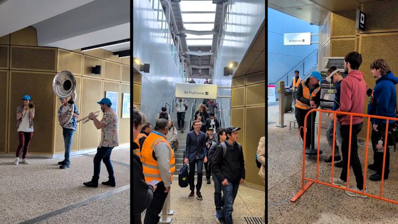Brass band plays as train departs for Metro Tunnel