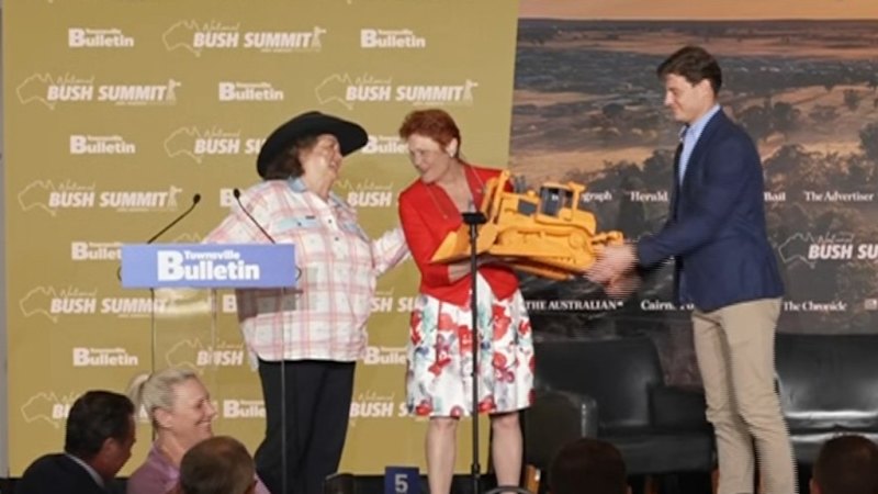 Gine Rinehart presents Pauline Hanson with 'big fat' bulldozer